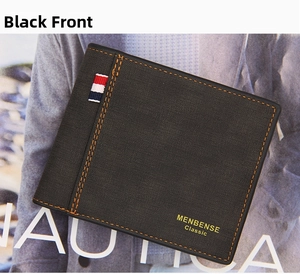 Detalle de cartera negra mate con cinta tricolor y costuras marrones de alta calidad