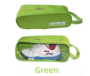 Detail view of green waterproof shoe bag with transparent window and handle