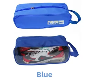 Detail of blue waterproof shoe bag featuring a clear window and durable zipper