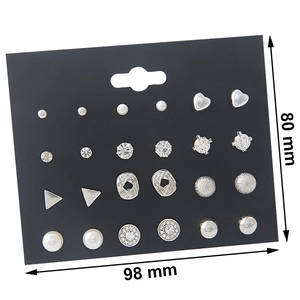 Detailed view of 12 pairs of stud earrings set with pearls and zircons on card