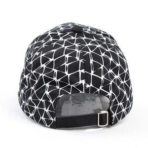 Detail of baseball cap rear with adjustable silver metal buckle and geometric pattern