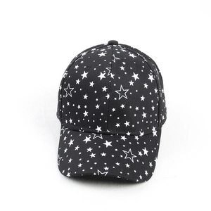 Top view of black cotton baseball cap with white pentagram stars and six-panel crown structure
