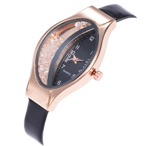 Detail of creative oval watch with black leather strap and floating rhinestones