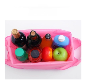 Pink oxford foldable shopping bag showing spacious interior with groceries and bottles