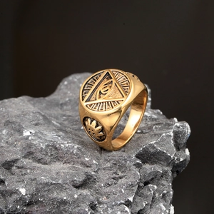 Detailed relief of the Eye of Providence on a gold-finished stainless steel signet ring