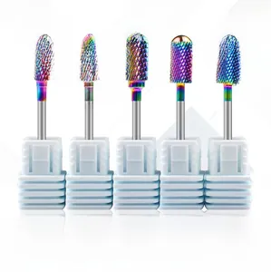 Macro view of five assorted rainbow carbide nail drill bits on a white holder