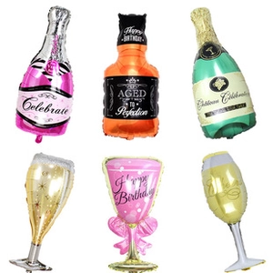 Selection of celebration foil balloons in wine bottle and goblet shapes for birthday parties