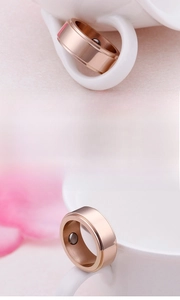 Detail of rose gold plated ring featuring an embedded magnet for health benefits