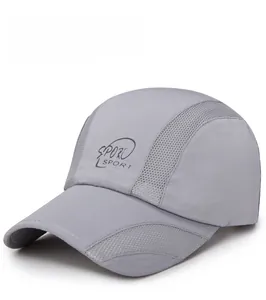 Detailed view of gray mesh baseball cap with breathable side panels and SPORT embroidery