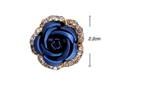Detail view of 2.2cm blue rose earring with gold plating and white crystal border