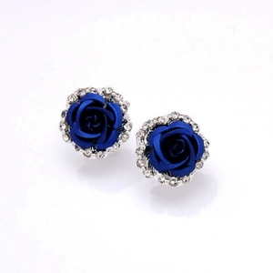 Elegant deep blue rose earrings with silver base and sparkling white rhinestones border