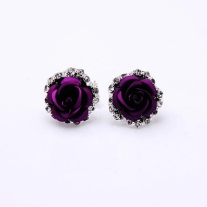 Elegant purple rose stud earrings with white crystal halo on a clean white background