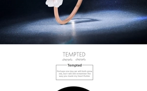Macro shot of rose gold flower ring with white petal inlay on a starry blue background