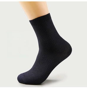 Detail view of black bamboo fiber mid-calf socks with high elasticity ribbed texture