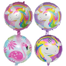 Set of four round foil balloons featuring colorful unicorn and flamingo graphics