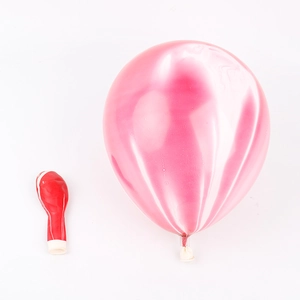 Detail of 12 inch metallic latex balloon in both deflated and inflated glossy pink state