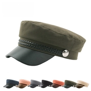 Detail showing various colors of the navy captain hat with a gold chain and faux leather brim