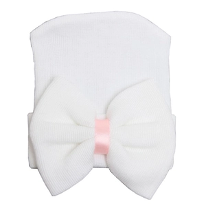 Bonnet blanc en tricot pour bébé avec un grand nœud pour nouveau-nés et nourrissons