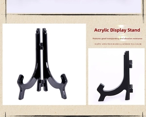 Macro view of a black folding acrylic display stand for plates and photo frames