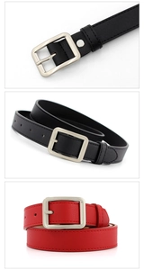 Detail of classic black and red leather belts with square silver metal buckles for women