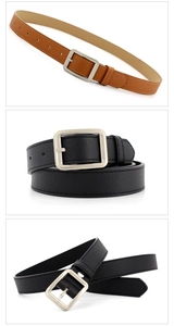 Close-up of slim leather belts in black and brown with silver square pin buckles