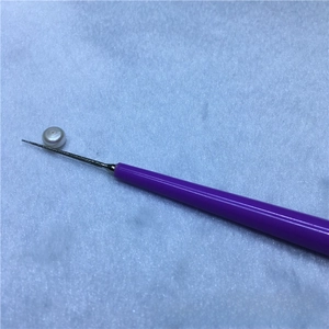Manual pearl reamer tool with purple handle for jewelry making and DIY hole enlarging