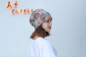 Close-up of lightweight floral graffiti knit beanie with soft breathable fabric