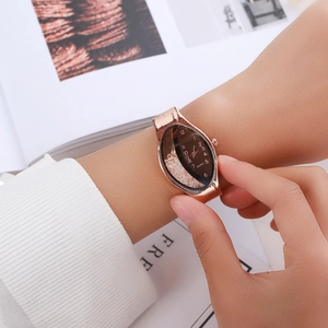 Elegant rose gold oval quartz watch for women with sparkling floating crystal dial design
