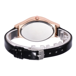 Detail view of the rose gold oval watch case and black leather strap with silver buckle