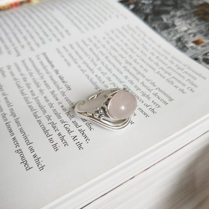 Detailed macro shot of the S925 silver stamp and pink crystal on a vintage open ring