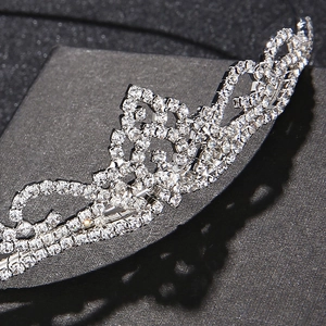 Elegant silver tiara with sparkling rhinestones for brides and girls birthday hair styling