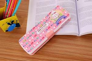 Pink cartoon pencil box on a desk with built-in sharpener and creative double opening