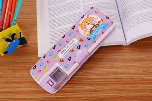 Detail of purple cartoon pencil case with built-in sharpener and elephant pattern