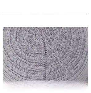 Detail of the spiral-knit top pattern and breathable mesh texture on the grey sun hat