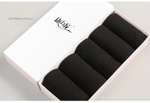Five pairs of black bamboo fiber socks in a white gift box with antibacterial properties