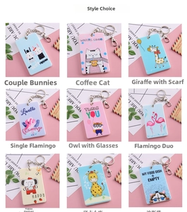 Collection of nine cute cartoon card holders with keychains in various animal patterns
