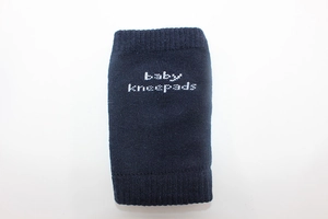 Close-up of navy blue breathable cotton baby kneepads with white baby kneepads print