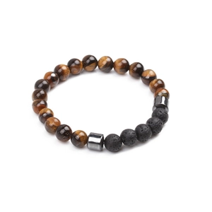 Close-up of tiger eye and black volcanic lava beads on a minimalist stretch bracelet