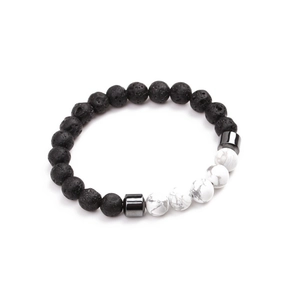 Close-up of beaded stretch bracelet with black lava rock and white pine turquoise stones