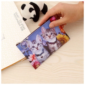 Detail of cute cat and sunflower print coin purse with zipper and metal keyring