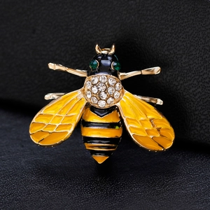 Exquisite gold honey bee brooch with yellow enamel wings and sparkling rhinestones