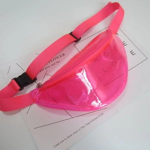Close-up of neon pink transparent PVC material on a functional waist bag with strap
