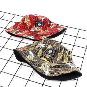 Japanese Ukiyo-e style bucket hat with koi fish print and square label in two colors