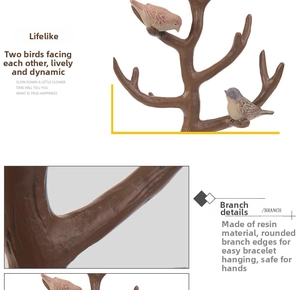 Close-up of resin jewelry stand with branch design and bird details for bracelets