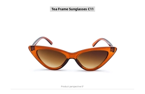 Front view detail of vintage cat-eye sunglasses with tea frames and gradient lenses C11
