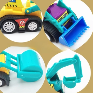 Detail showing movable mechanical arms and wheels of mini toy construction vehicles