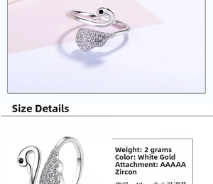 Macro detail of adjustable swan ring with white gold plating and AAAAA zircon stones