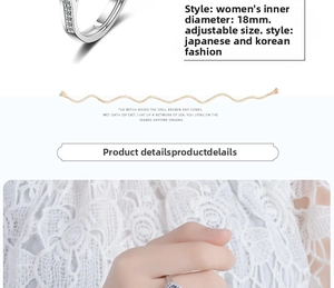 Detail of adjustable silver ring for women with cubic zirconia inlay and 18mm diameter