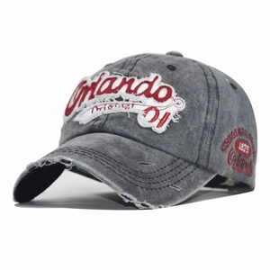 Detailed view of the vintage washed denim baseball cap with Orlando letter embroidery