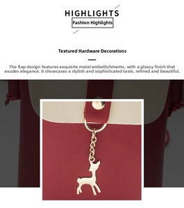 Detailed view of the deer-shaped golden metal pendant and buckle on the shoulder bag